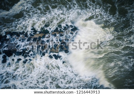 Aerial of Surfers in Big Waves in Belmar New Jersey