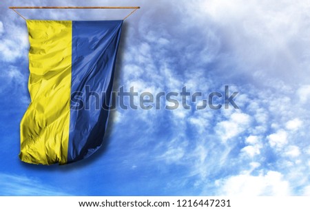 Flag of Ukraine. Vertical flag, against blue sky with place for your text