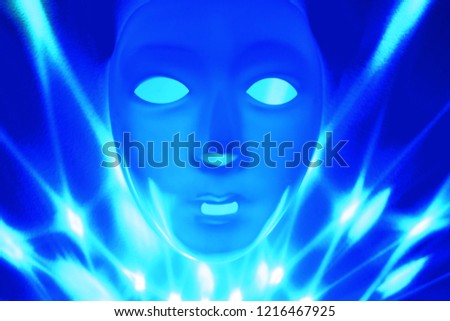 Blue dramatic mask stock images. Plastic human mask. Blank male mask Halloween. Mental illness abstract picture stock images. Blue face