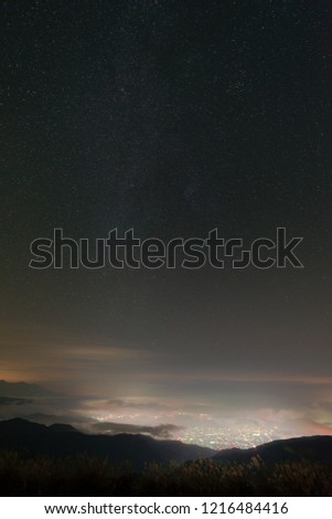 lake suwa with starry sky on vertical position