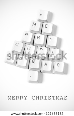 Christmas card - Christmas tree made of computer keys, white background with vignette