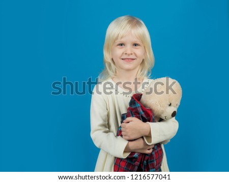 My funny friend. Little girl with teddy bear. Small girl hold toy bear. Little child with soft toy. Small kid happy smiling. My favorite childhood toy. Happy childhood, copy space.