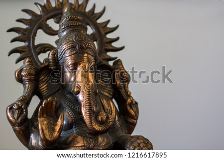 Lord Ganesha statue on white background