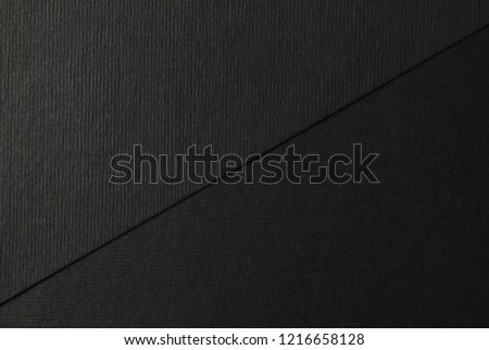 Black cardboard divided in two parts for your design, lettering concept 