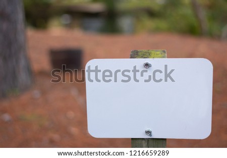 Blank sign in autumn setting