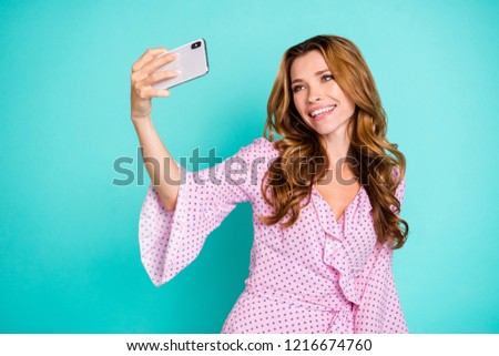 Profile side view half turn cute sweet gorgeous nice stunning adorable good-looking good-dressed lady with her hairdo she take picture on cellular isolated on vivid turquoise background