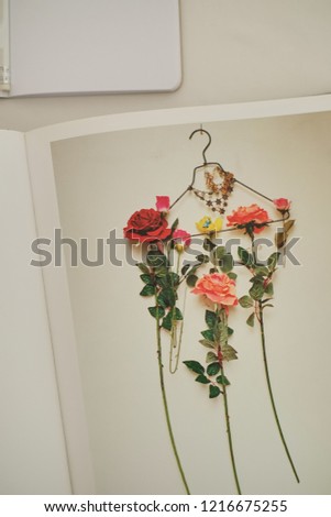 beautiful flowers on a hanger picture illustration in the book