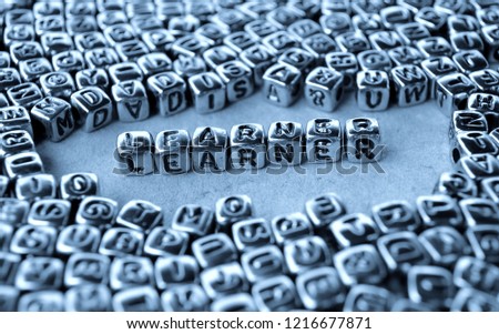 Learner - Word from Metal Blocks on Paper - Concept Photo on Table
 Royalty-Free Stock Photo #1216677871