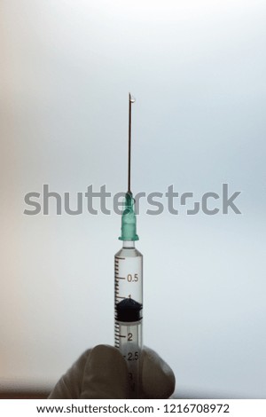 Syringes used for mixing and dispensing drugs in hospitals. Patient illness. Nurses or doctors used syringe for injection.