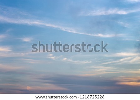 Background of sky with purple clouds of the golden hour
