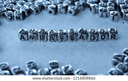 Ambassador - Word from Metal Blocks on Paper - Concept Photo on Table
 Royalty-Free Stock Photo #1216808866
