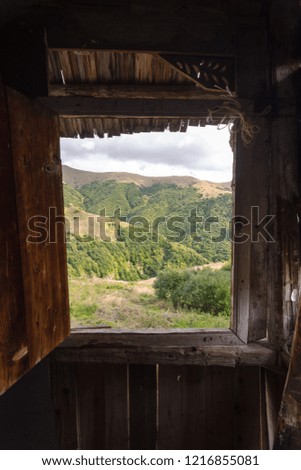 fantastic view from an unusual window on the Caucasus mountains of the Alps in the summer of spring in autumn in South Ossetia