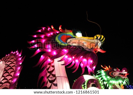 photo of beautiful illuminated chinese dragon lantern