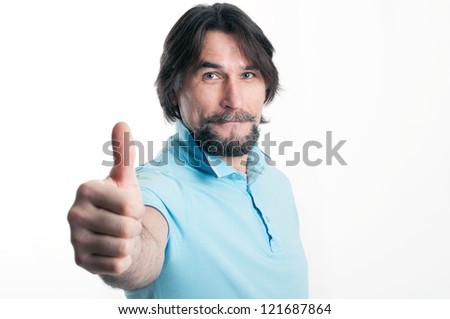 Man shows a sign of "okay" on a light background