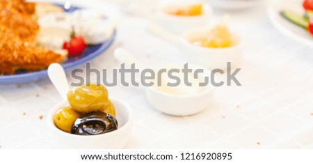 Honey, Jam, Olives, Simit. Authentic turkish breakfast. Local cuisine concept. Soft focus. Horizontal, wide format, banner