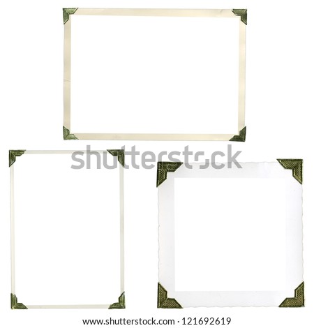 Collection of old photo corners, frames and edges isolated on white in high resolution Royalty-Free Stock Photo #121692619
