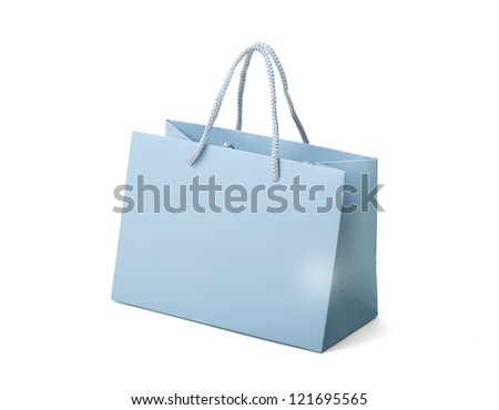 Bag as a gift. Paper bag on white background. Close Up.