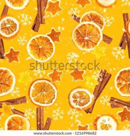 Christmas background of dried oranges, orange peel in the shape of a star and with cinnamon. Seamless background