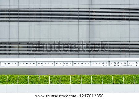 Architecture Advertising Real Estate Design Concept, Contemporary Modern  Building Pattern with Green Bush for Property Sale, Office Planning Facility with Gray Material in Background and Copy Space