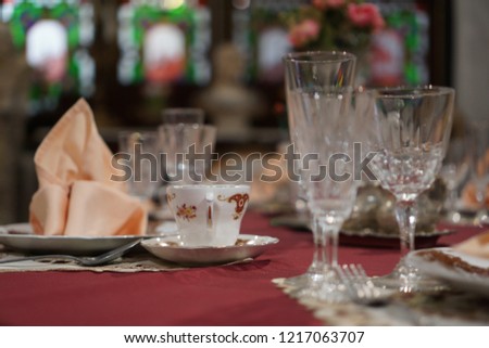 Selective focus of Pinang Peranakan dining room plate setup. Royalty-Free Stock Photo #1217063707