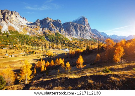 Beautiful view of the Mt. Tofana di Rozes from Falzarego pass. Location Cortina d'Ampezzo, Dolomiti, South Tyrol, Italy, Europe. Scenic image of idyllic autumn wallpaper. Discover the beauty of earth.