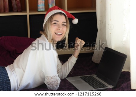 Woman with a laptop on Christmas holidays
