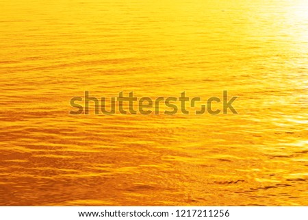 Abstract shiny color gold wave.  Golden background