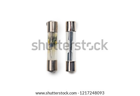 burned-out fuses (Short Circuit) and new fuses for Car ,motorcycle on white background Royalty-Free Stock Photo #1217248093