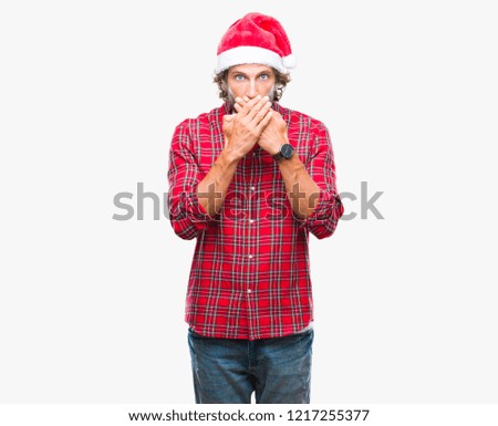 Handsome hispanic man model wearing santa claus christmas over isolated background shocked covering mouth with hands for mistake. Secret concept.
