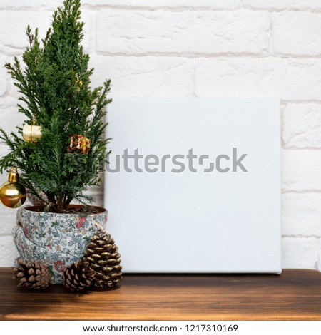 Mock up poster. White empty canvas and brick wall. Christmas concept.