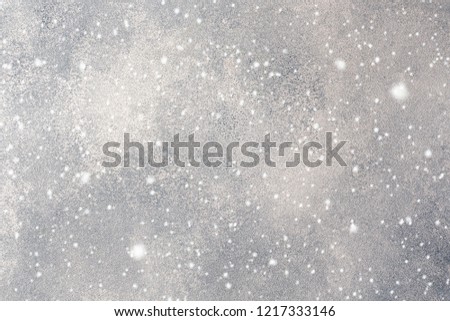 cement texture and gray concrete wall background. Old grunge dark textured wooden background, with falling snowflakes