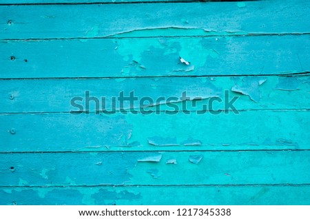 Blue surface cracked on plank floor.
Blue wood background view Can be used for background or wallpapers.