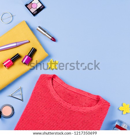 Woman fall clothes and accessories flat lay. Female autumn fashion concept. Top view