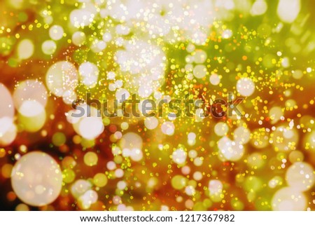 Festive Background With Natural Bokeh And Bright Golden Lights.