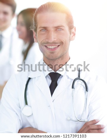 smiling doctor therapist on blurred background.