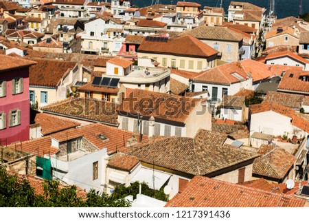 south Mediterranean small city houses with orange shingles roofs from above aerial shot