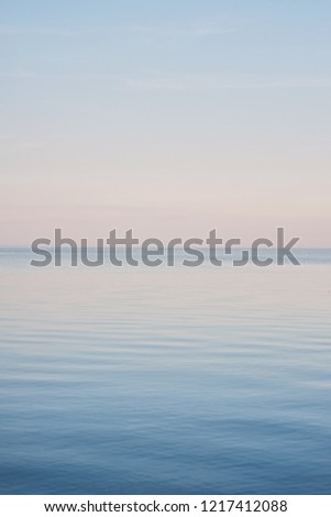 Blue sky landscape without clouds spreading on the sea in the late winter