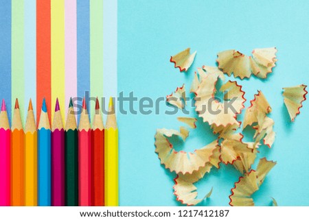 colored pencils, trash and rainbow colorful stripes, stationary