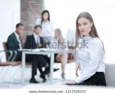 young business woman on the background of the office