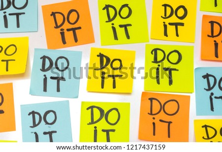 Do It Handwriting Paper Notes Stick On Whiteboard In Workplace.