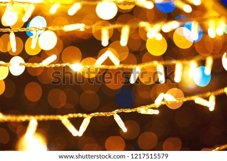 Full Frame Shot Of Illuminated String Lights and bokeh