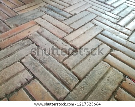 Texture and pattern of bricks on the corridor.