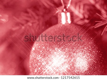 branch of spruce in frost Red Christmas ball Selected focus Toned