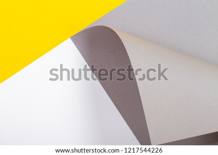 Abstract geometric shape white yellow gray color paper background