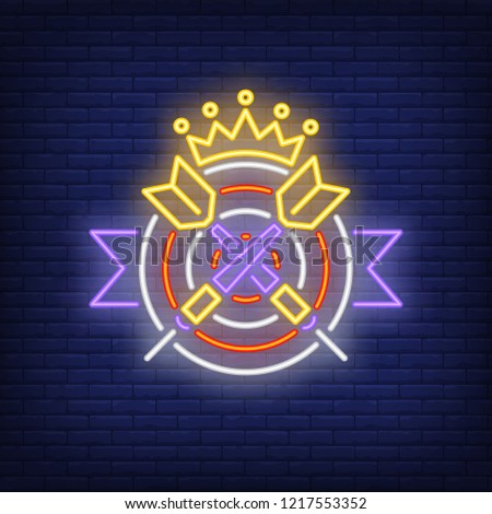 Two crossed darts on target with crown neon sign. Illustration of two crossed darts on target with crown on dark brick blue background. Can be used for topics like entertainment, games, advertisement