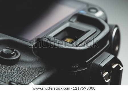 close up view of a DSLR camera view finder in dark atmosphere