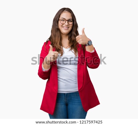 Beautiful plus size young business woman wearing elegant jacket and glasses over isolated background success sign doing positive gesture with hand, thumbs up smiling and happy. Looking at the camera 