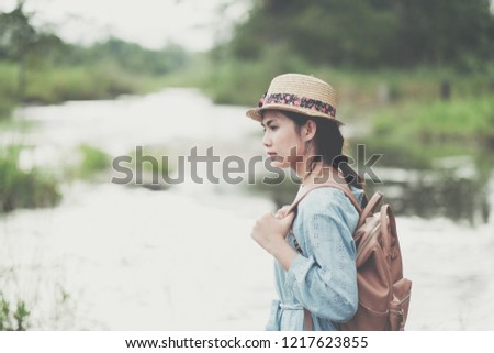 Young female with map in hands. Woman  tourist is explor new world. Search of new adventures. 