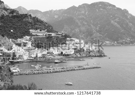 B&W panoramic view of the town and port of Amalfi, Italy, with Lattari Mountain at the back
The town of Amalfi lies at the mouth of a deep ravine, at the foot of Monte Cerreto (1315 m).
