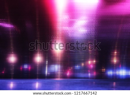 Futuristic pink and purple neon night lights of the city